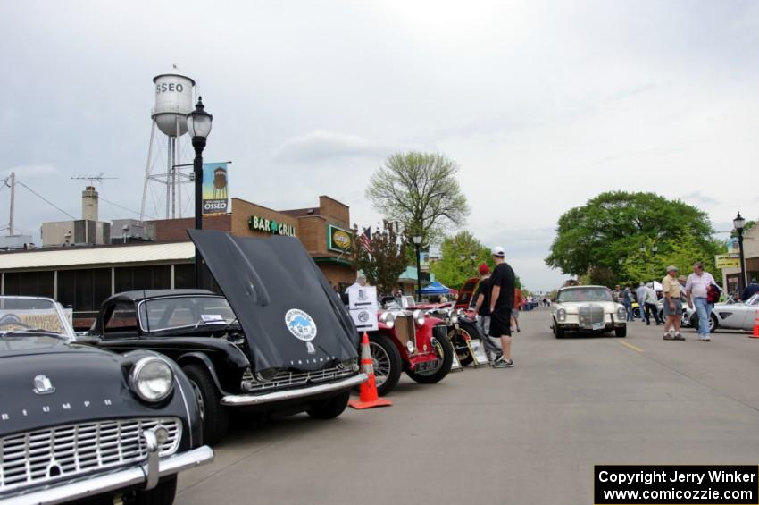 Triumphs and a Mercedes-Benz