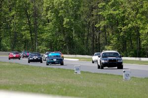 The Spec Miata field comes into turn 4 on the pace lap.