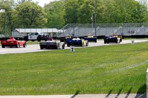 The Spec Racer Ford field comes through turn 12 on the pace lap.