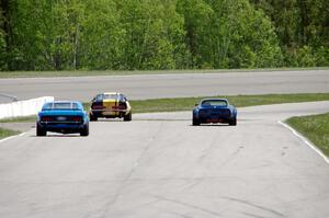 Shannon Ivey's Ford Mustang Shelby GT350, Darwin Bosell's Chevy Corvette and Brian Kennedy's Ford Mustang