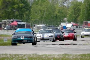 Mark Utecht's ITJ Honda Civic with Chris Craft's, Samantha Silver's Spec Miata Mazda Miatas