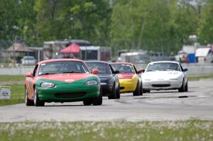 Erik Nelson's, Paul Gilbert's, Greg Youngdahl's and Nick Lougee's Spec Miata Mazda Miatas