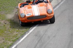 Rich Stadther's Elva Courier spins coming out of turn 12.