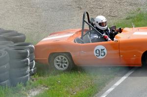 Rich Stadther's Elva Courier spins coming out of turn 12.