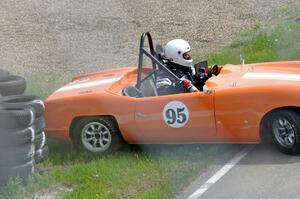 Rich Stadther's Elva Courier spins coming out of turn 12.