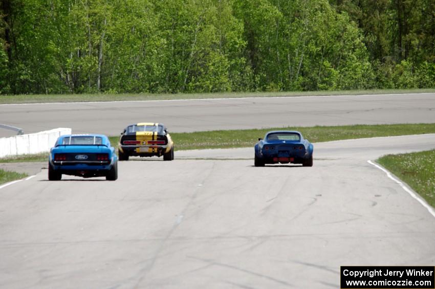 Shannon Ivey's Ford Mustang Shelby GT350, Darwin Bosell's Chevy Corvette and Brian Kennedy's Ford Mustang