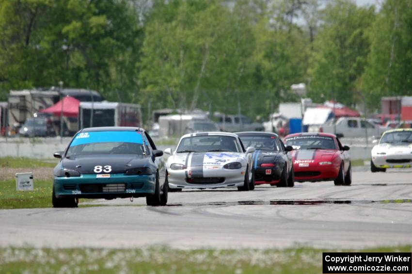 Mark Utecht's ITJ Honda Civic with Chris Craft's, Samantha Silver's Spec Miata Mazda Miatas