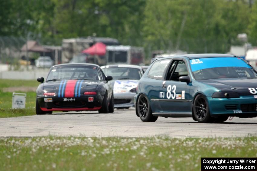 Mark Utecht's ITJ Honda Civic with Samantha Silver's and Chris Craft's Spec Miata Mazda Miatas