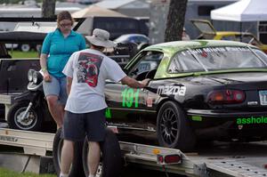 Aaron Jongbloedt's Spec Miata Mazda Miata in the paddock.