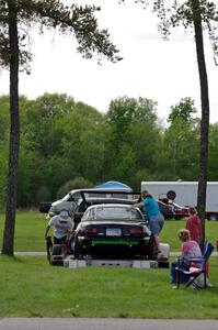 Aaron Jongbloedt's Spec Miata Mazda Miata in the paddock.