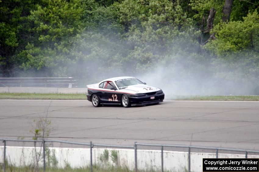 Tom Fuehrer's SPO Ford Mustang loses the engine.