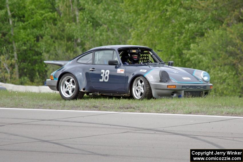 Craig Stephens' ITE-1 Porsche 911 at the topside of turn 1.