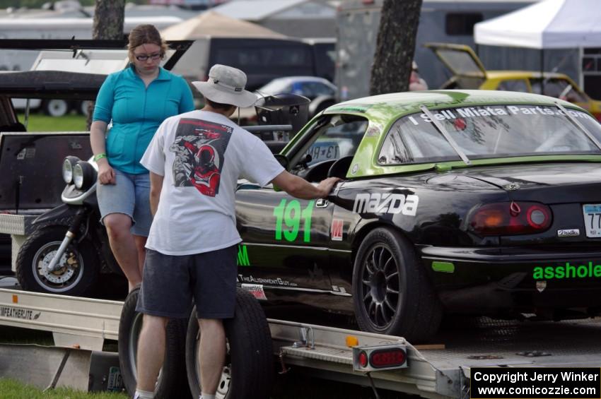 Aaron Jongbloedt's Spec Miata Mazda Miata in the paddock.