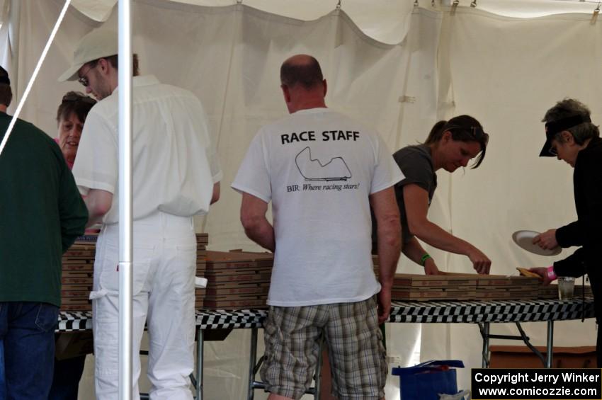 Workers at the post-race pizza party.