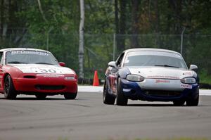 Tom Roberts' PTE Mazda Miata and Team Cohn's PTE Mazda Miata