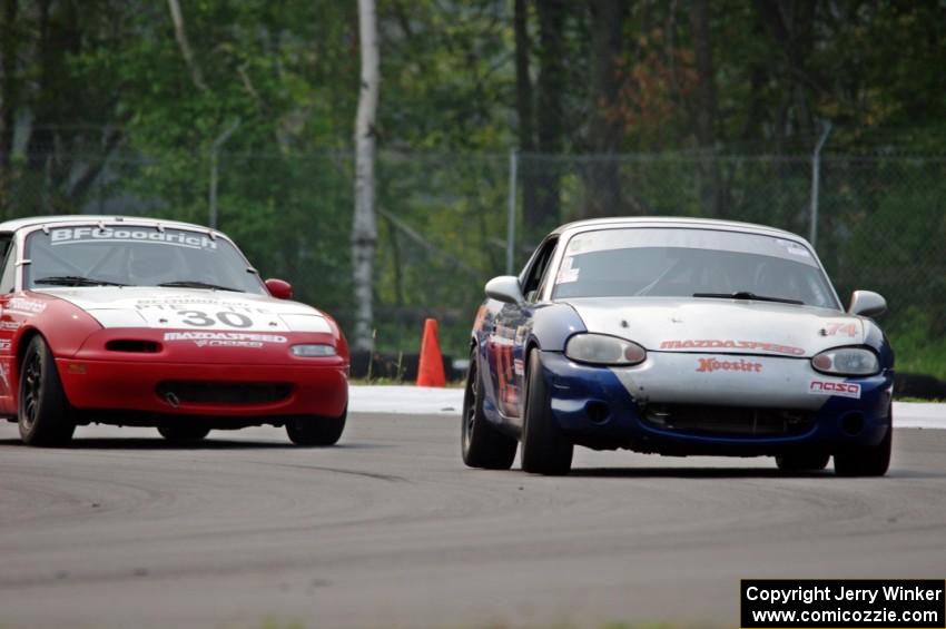 Tom Roberts' PTE Mazda Miata and Team Cohn's PTE Mazda Miata
