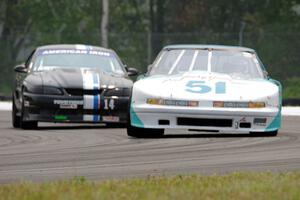 Guy Dirkin's SU Olds Cutlass Supreme and Jeff Demetri's American Iron Ford Mustang