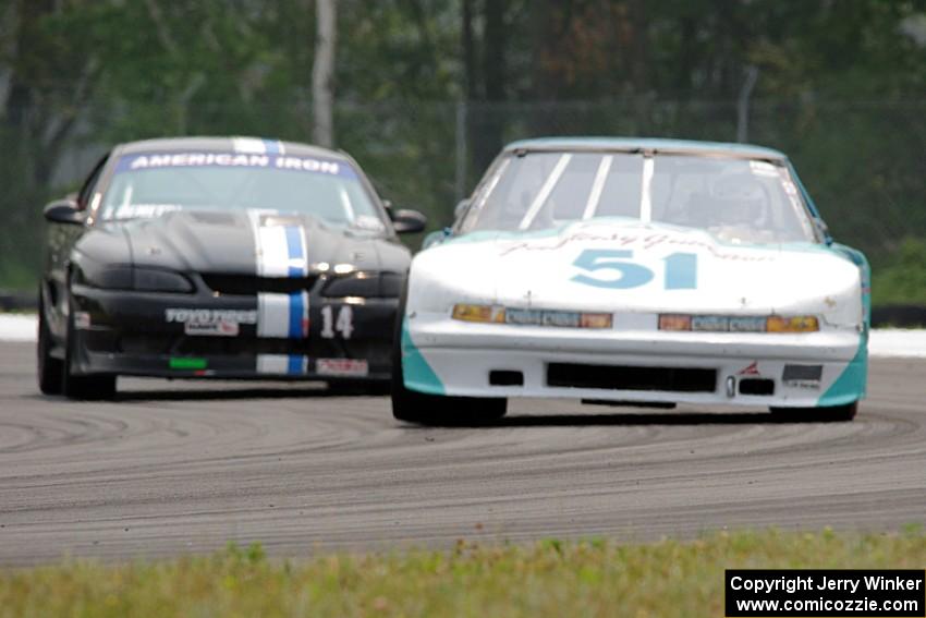 Guy Dirkin's SU Olds Cutlass Supreme and Jeff Demetri's American Iron Ford Mustang