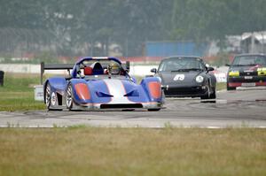 Jed Copham's SU Radical SR3, Phil Magney's GTS4 Porsche 993 and Brett Westcott's PTE Nissan Sentra SE-R