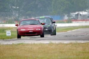 Nick Scott's PTE Mazda Miata and Team STI Guys' ST3 Subaru WRX STi