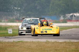 Matt Gray's PTB Spec Racer Ford and Rick Iverson III's GTS4 BMW M3