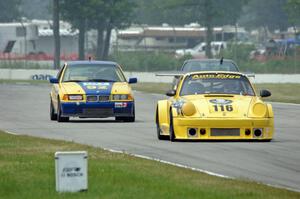 Lance Van Norman's HPDE3 Porsche 911 and Andy Orr's GTS2 BMW 325i