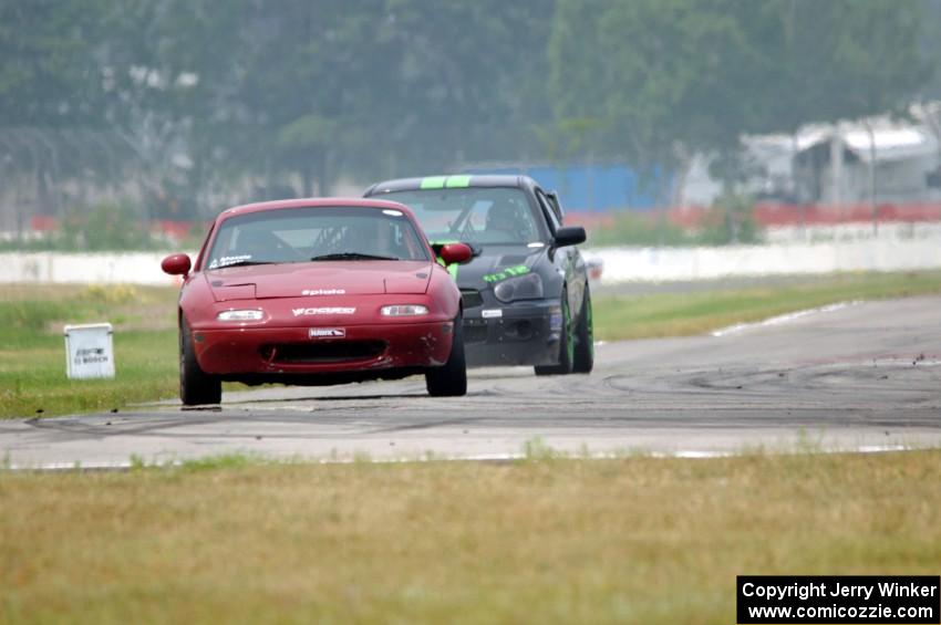 Nick Scott's PTE Mazda Miata and Team STI Guys' ST3 Subaru WRX STi