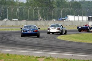 Chris Craft's PTE Mazda Miata and Tom Roberts' PTE Mazda Miata