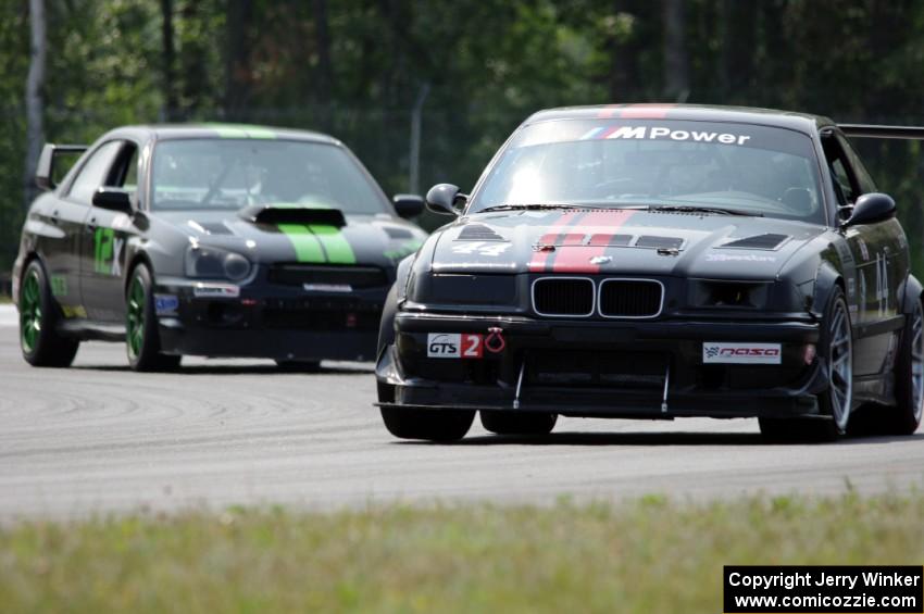 Kerry James' GTS2 BMW M3 and Team STI Guys' ST3 Subaru WRX STi