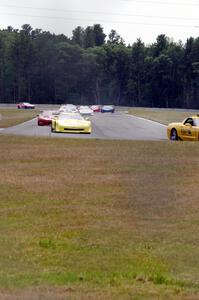 The pace car brings the field through turn 4 before the race.