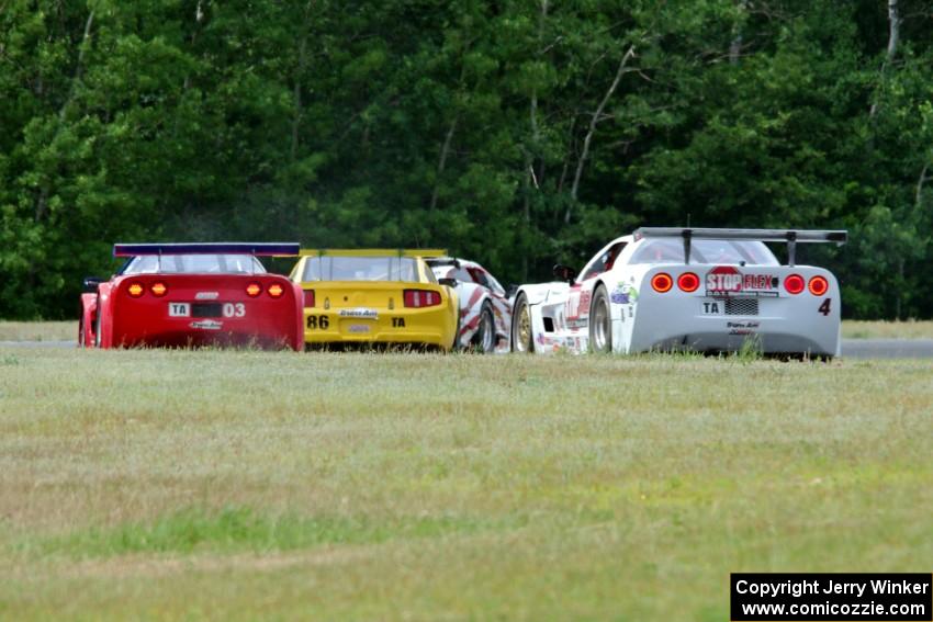 Dave Pintaric's Chevy Corvette, John Baucom's Ford Mustang, Jim McAleese's Chevy Corvette and Paul Fix's Chevy Corvette