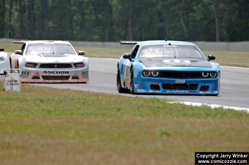 Cameron Lawrence's Dodge Challenger and Adam Andretti's Ford Mustang