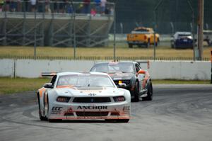 Adam Andretti's Ford Mustang and Ernie Francis, Jr.'s Chevy Camaro