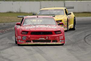 Ron Keith's Ford Mustang and Tom Sheehan's Chevy Camaro