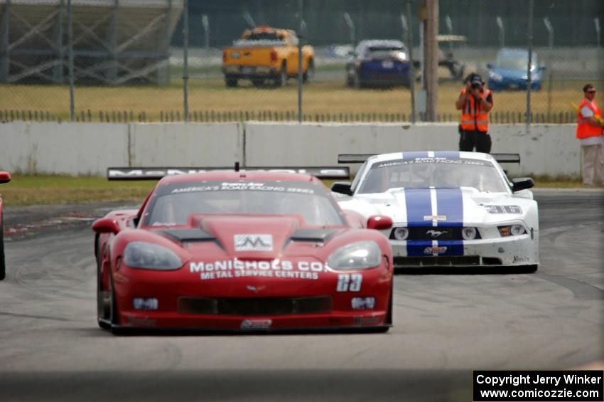 Amy Ruman's Chevy Corvette and Cliff Ebben's Ford Mustang