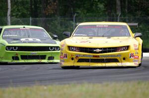 Tom Sheehan's Chevy Camaro and Joe Stevens' Dodge Challenger