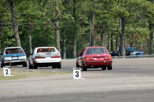 North Loop Motorsport BMW 325i, Motorcrap Racing Ford Mustang and Probs Racing BMW 325is