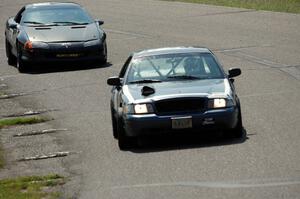 Moss Racing Ford Crown Victoria and ProKart Racing Chevy Camaro