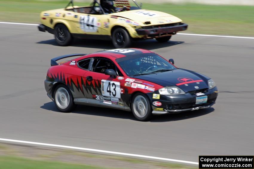 Left Shark Racing Hyundai Tiburon and Rat Patrol Triumph TR-7