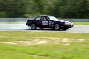 Purple-Headed Chumps Ford Mustang loses its engine at turn 3.