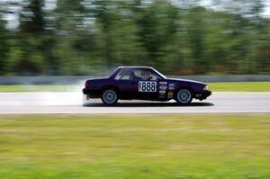 Purple-Headed Chumps Ford Mustang loses its engine at turn 3.