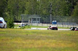 Several cars head into turns 7 and 8.