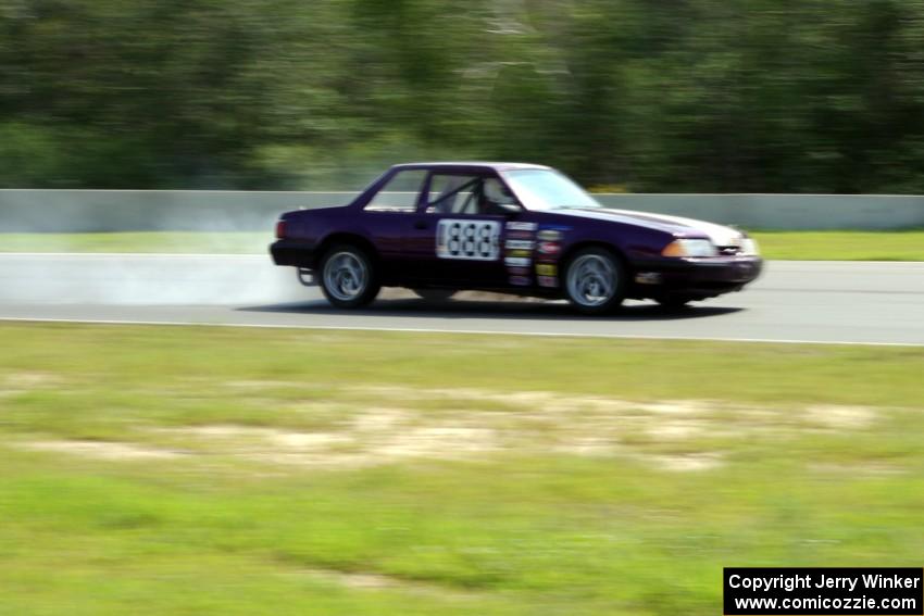 Purple-Headed Chumps Ford Mustang loses its engine at turn 3.