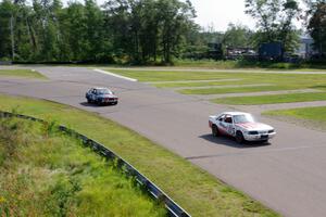 Motorcrap Racing Ford Mustang and North Loop Motorsport BMW 325i