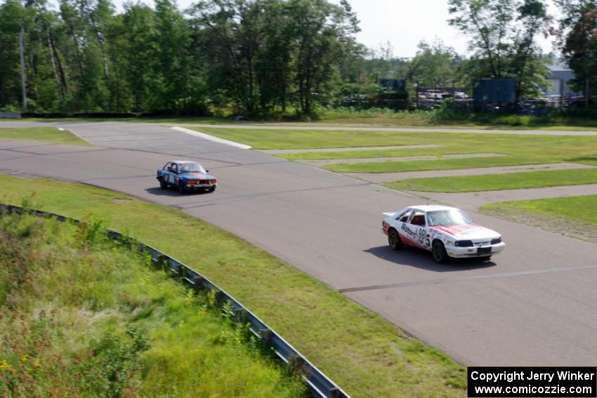 Motorcrap Racing Ford Mustang and North Loop Motorsport BMW 325i