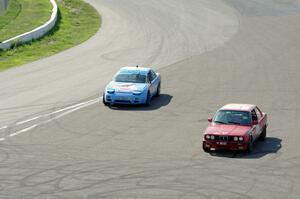 Team McQueen Nissan 240SX and Probs Racing BMW 325is