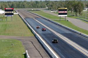 Team Jagermoose Porsche 914, and Mayhem Racing Honda Civic on the front straight.