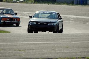 JSK Racing Nissan Maxima and North Loop Motorsport BMW 325i