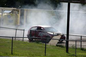 Three Sheets Racing Ford Focus ZX3 recovers after having a spin headed into turn 10.