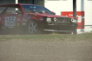 Dead Pedal Racing Maserati Biturbo stalls after a spin at turn 10.